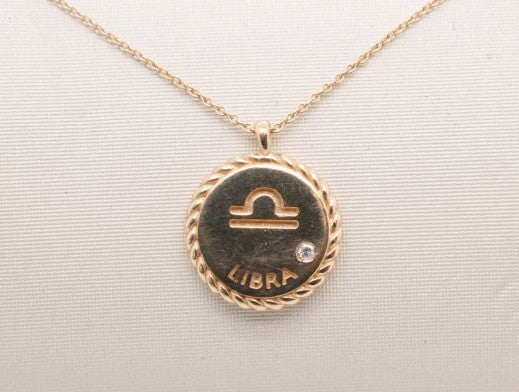 14K YELLOW GOLD LIBRA NECKLACE D= 0.01CTW