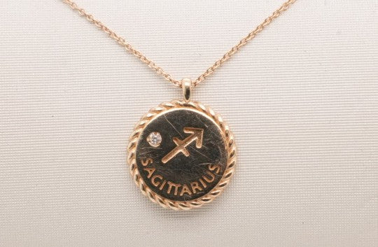 14K YELLOW GOLD SAGITARIUS NECKLACE D= 0.01CTW