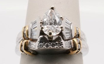 PLAT/18KY 1.00CT PEAR CENTER SI1/G APX 1.50CTW