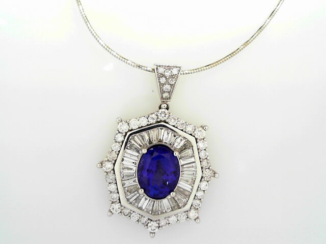 14KW 4.75CTW ROUND BAGUETTE DIA 6.50 CT OVAL TANZANITE PENDANT