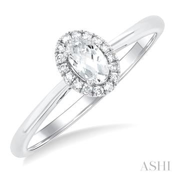 10K WG OVAL HALO WHITE TOPAZ RING 0.07CTW