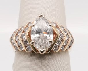 14K YG ENG RING CENTER MARQUISE APX 1.25CTW SI2/H SEMI 0.75CTW