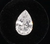 0.60CTW PEAR DIAMOND SI2/G