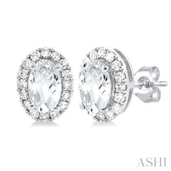 10K WG OVAL HALO WHITE TOPAZ EARRINGS 0.13CTW