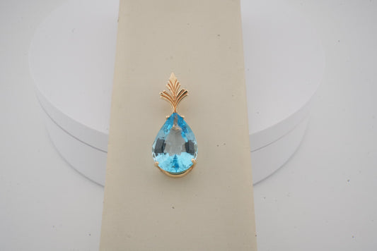 ESTATE 14K YG PEAR SHAPE BLUE TOPAZ PENDANT