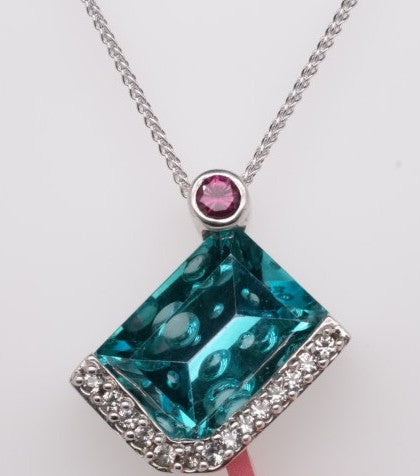 FRANK REUBEL SS 10CT CARIBN TOPAZ .20 CT PINK TOUR .21 WS PENDANT