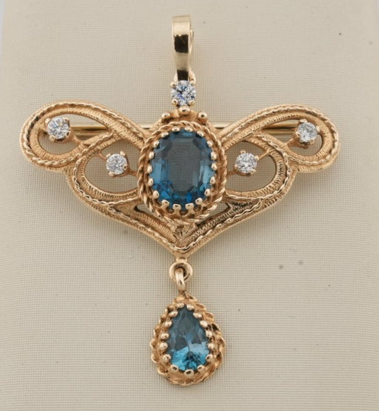 ESTATE 14K YG BLUE TOPAZ AND DIAMOND PIN/PENDANT