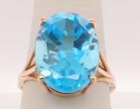LADIES 10K YG BLUE TOPAZ OVAL RING