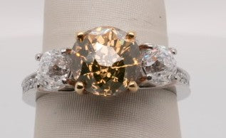 18KW 4.95CTW 3.27CTR FANCY BROWN 1.41CTW ROUNDS 0.27 SIDES CROWN OF LI