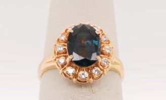 LADIES 18KYG RING BLUE TOPAZ 2.23CTW DIAM 0.13CTW