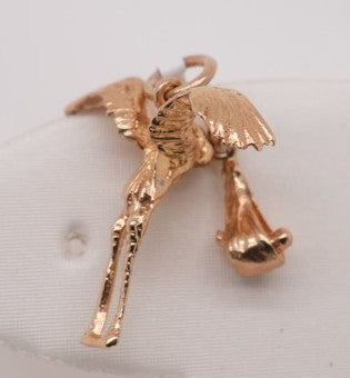 14KYG STORK WITH BABY CHARM