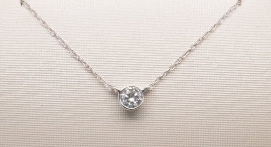14KW SOLITAIRE BEZEL ROUND DIAMOND 0.20CTW
