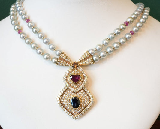 LADIES PEARL NECKLACE APX 4.5CTW RUBIES 1.25CTW SAPPHIRE 2.0CTW