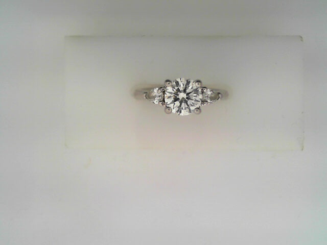 PLATINUM RING RD CENTER 1.01CT VSI/I WITH PEAR SIDES 0.25CTW VS1/GH GI