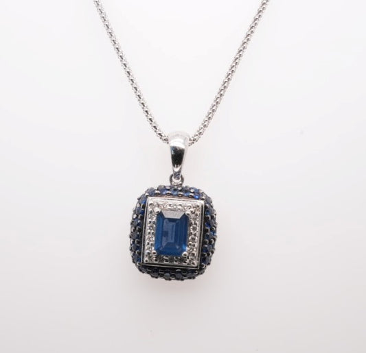 LADIES 14KW EMERALD SHAPE SAPPHIRE & DIAM PENDANT ON WG ADJUSTABLE CHA