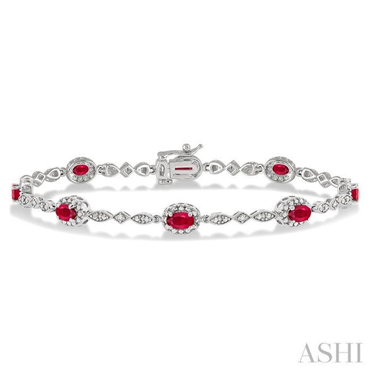 14KT WG RUBY & DIA .05CTW BRACELET