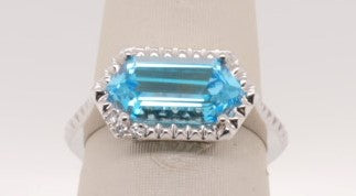 LADIES 14KWG BLUE TOPAZ 2.77CTW  D=0.02CTW