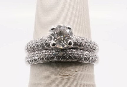 18KW WEDDING SET APX 0.70 SI1/G CENTER