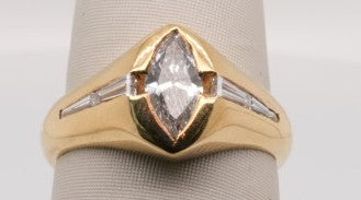 LADIES 18KYG MARQUISE BEZEL SET 0.75CT SI2/H