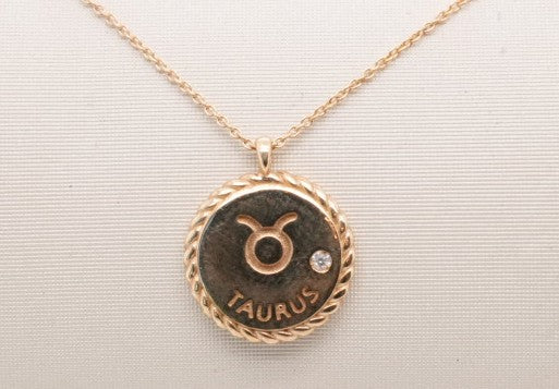 14K YELLOW GOLD TAURUS NECKLACE D= 0.01CTW