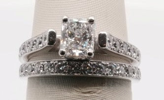 14K WG RADIANT 0.84CT VS2/F WITH 0.59CTW TWENTY-SEVEN ROUNDS SI1/GH DI