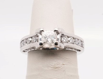 PLATINUM ENG RING PRINCESS CENTER APX 0.50CTW SI1/H