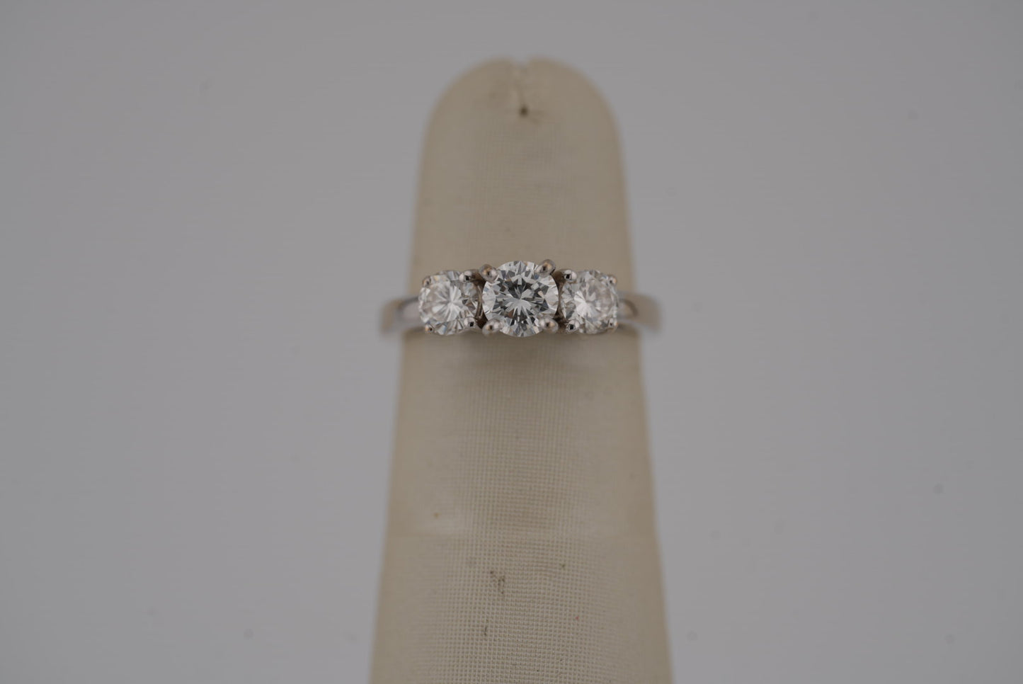 14K WG 3 STONE ROUND .75CTW SI2/H