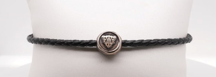 GUCCI Woven Black Leather Bracelet with Sterling Silver Crest