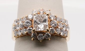 LADIES 18KY ENG RING RADIANT 0.64CTW G/SI2 DIA 1.10CTW